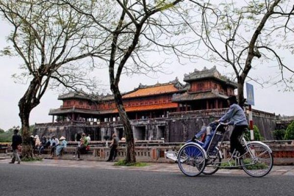 Taking cyclo tour through Hue City